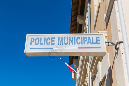 市政警察市警在警察局的商店前街口签字命令蓝色力量机构车辆罪行司法当局执法方法背景