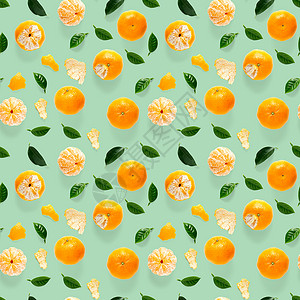 普通话无缝图案 橘子和克蕾婷 以绿色背景与绿叶隔绝 收集完好的无缝图案热带水果墙纸柑桔设计收藏作品情调食物橙子背景图片