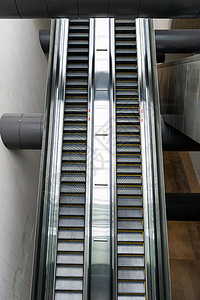 大大楼的电车手车站自动扶梯购物商业扶手梯子人行道电梯运输建筑背景图片