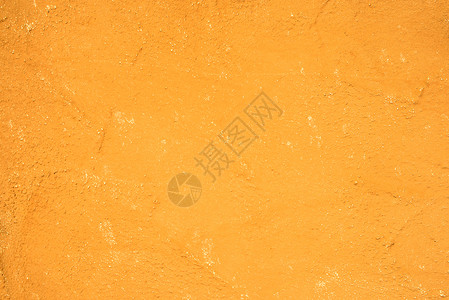 带棕色涂层的混凝土墙壁毛孔房子劳动房间石膏黄色服饰工艺背景图片