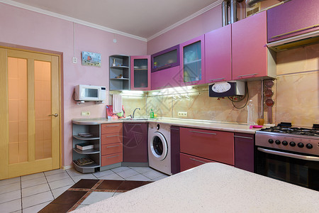 一个小公寓的现代宜居式厨房 小型小公寓台面衣柜桌子房地产餐具工作房子烤箱客厅配件背景图片