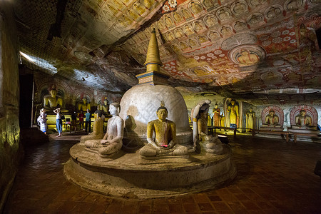佛图关斯里兰卡达姆布拉洞穴寺内斯图帕和雕像游客吸引力历史性圆顶旅游世界世界遗产佛教徒观光洞穴背景