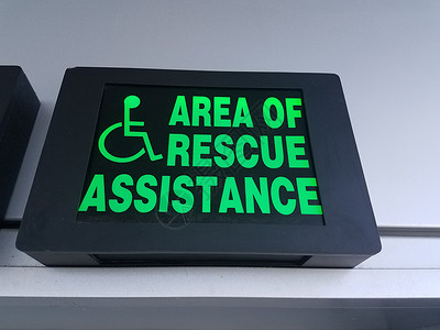 使用轮椅的救援救助援助标志绿区背景图片