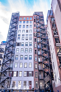 看着新纽约市曼哈顿的天线地标大楼景观街道摩天大楼旅行建筑物日落办公室城市纽约城高清图片素材