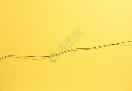 浅黄色纸质和生锈的电线背景图片