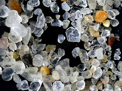 显微镜下的沙粒背景图片