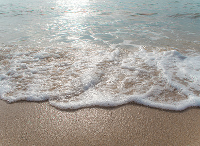 海浪泡沙尘热带白色气泡海岸泡沫背景图片