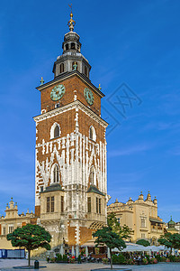 波兰克拉科夫市市政厅塔建筑流行音乐天空正方形假期旅游旅行游客城市观光背景图片