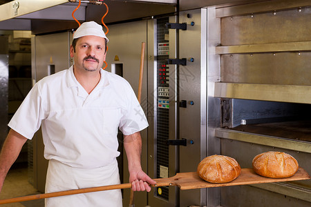 蒸馒头男人男性面包师烘烤面包制造业男人馒头烤箱包子职业味道食品手工工业背景