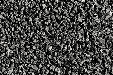 特写活性炭纹理 椰炭工业木质活性煤炭吸水性药店颗粒剂黑色吸附剂过滤背景图片