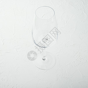 白石底的洁净葡萄酒杯 正方格式水晶白色眼镜葡萄园空白纹理干杯背景石头杯子背景图片