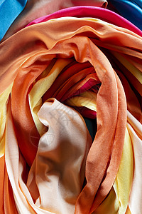 一组多色布窗帘红色棉布服饰织物零售彩虹收藏壁橱光谱店铺背景图片