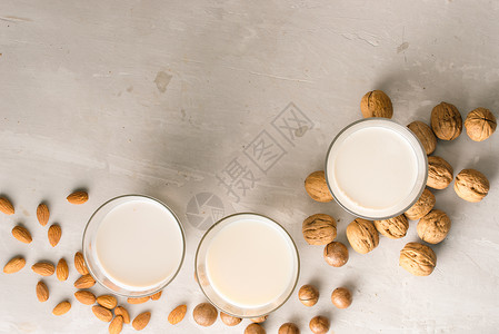 牛奶眼镜 麦加达米亚 杏仁 胡桃奶制品饮食腰果产品坚果营养榛子食物白色核桃背景图片