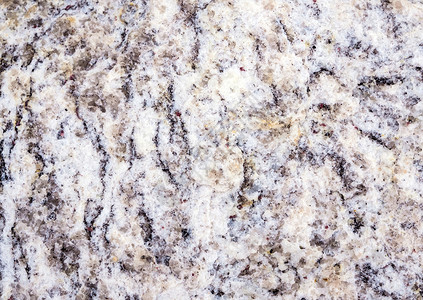 花岗岩岩石表面的纹理鹅卵石白色建造灰色材料背景图片