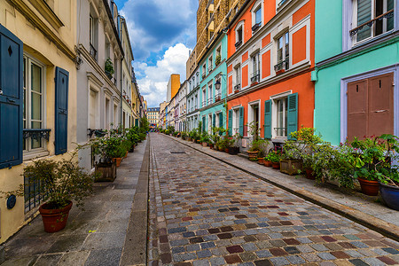 法国巴黎克雷米厄街 位于第 12 区的是巴黎最漂亮的住宅区街道之一 巴黎街的彩色房屋 法国房子小街自行车住宅国家灌木建筑学建筑城背景图片