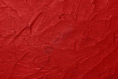红色凹凸不平的垃圾表面抽象背景背景图片