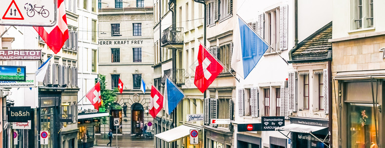 靠近市中心街 瑞士建筑和瑞士苏黎世旅游目的地的购物街和历史悠久的老城建筑 商店和奢侈品店大街街道地标乙肝旅行历史性旗帜商业市中心背景图片