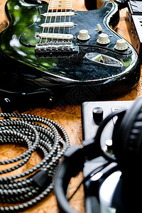 低音键吉他和工作室设备指板乐队音乐家摄影电线电子电缆音乐低音乐器背景