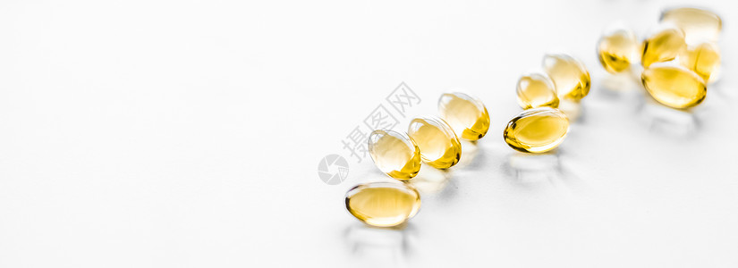 维生素 D 和金欧米茄 3 丸用于健康饮食营养 鱼油食品补充丸胶囊 保健和药物作为药学背景制药食物抗生素疫苗医生临床品牌剂量饮食背景图片