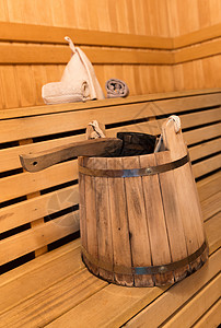 桑桑水设备蒸汽浴室木头浴缸钢包帽子卫生休息身体毛巾背景图片