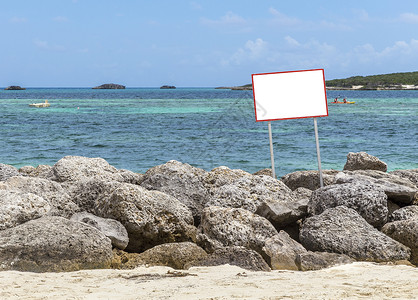 海洋岩石上的标志游客蓝色运动海滩独木舟控制板风景横幅广告海岸线背景图片