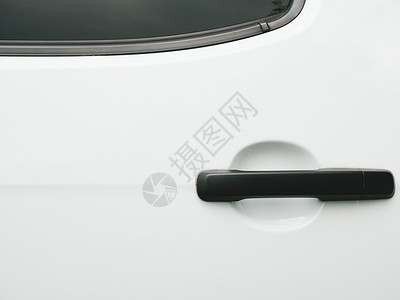白色背景上的黑色车门把手 汽车和纹理概念 汽车工业和安全锁和遥控钥匙配件概念 车辆部分解锁主题驾驶高清图片素材