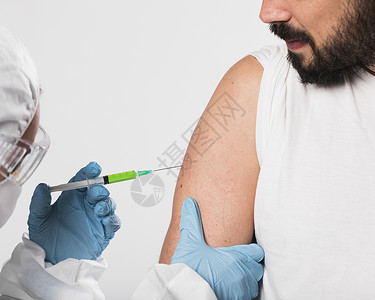 拒绝毒疫苗被接种疫苗的胡子大胡子人 高品质的照片背景