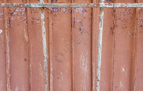 耐候钢旧混凝土墙底背景结构 加固混凝土 装有损坏和生锈的金属配件背景