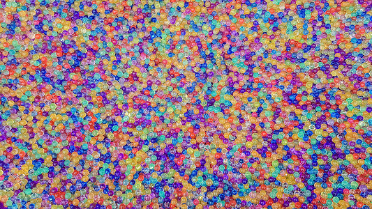 高分子聚合物许多不同颜色的水凝胶球 组的多彩多姿的 orbis 游戏用水晶水珠 氦气球 可以用作背景 高分子凝胶硅胶吸附剂庆典宏观气球墙纸吸背景