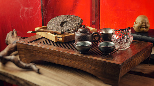 茶几与仪器茶壶杯子煎饼和茶沉普洱叶子智慧药品木头沸腾快乐礼仪圣火食物活力背景