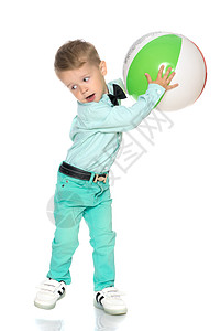 有个小男孩在玩球玩家体育场青年场地活动竞赛孩子运动护胫比赛背景图片