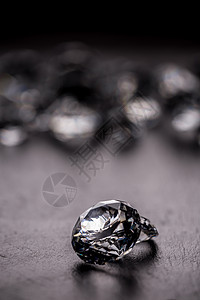 闪光钻石火花珠宝黑色玻璃圆形水晶奢华宝石财富宝藏背景图片