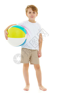 有个小男孩在玩球冠军行动比赛玩家草地团队球员竞赛训练孩子背景图片