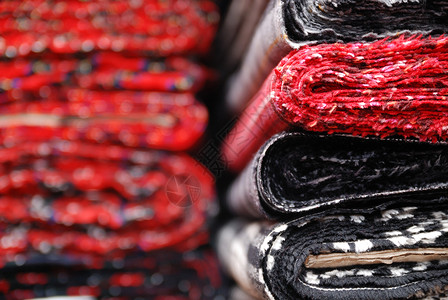 织布样品样本橙子羊毛织物市场商品风格柔软度装饰小地毯纺织品背景图片