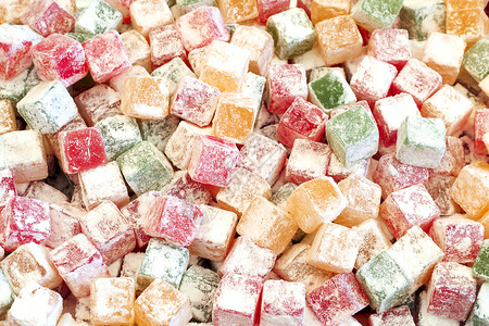 水果糊糖覆盖糖果背景和不同颜色的糖背景图片