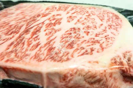 寿字花纹甲5型Wagyu A5型牛肉的许多部分含有高分辨率浮标纹理盘子餐厅晚餐牛肉屠夫炙烤烹饪美食花纹奢华背景