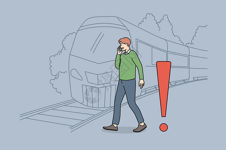 男人在电话上交谈无视铁路轨道安全规则背景图片