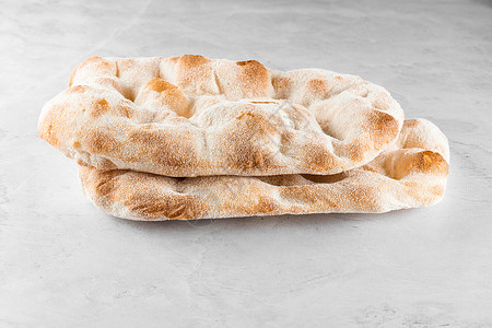 轻背景的罗马纳葡萄酒 意大利美食手工面包面粉酵母小麦糕点烘烤食物面包师烹饪背景图片
