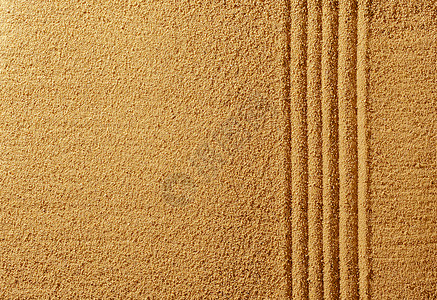 夏天沙滩上黄沙的直线线背景图片
