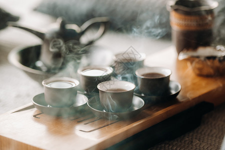 准备和一家大公司举行茶茶仪式植物茶杯开水浓茶礼仪餐具文化陶瓷杯子传统背景图片
