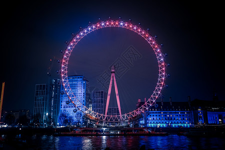 伦敦眼伦敦飞轮轮闲暇摩天轮建筑城市休闲地标照明车辆设施街景背景图片