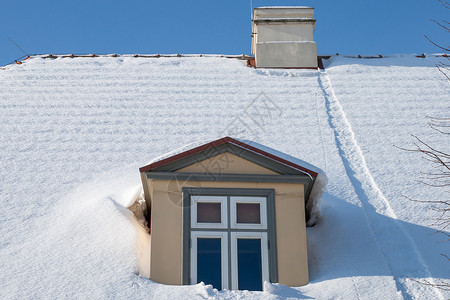 雪盖屋顶屋顶背景图片