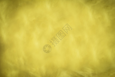 抽象壁背景 模糊和挥发的黄色涂料背景图片