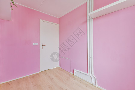 带有粉色墙壁的宽敞空房背景图片