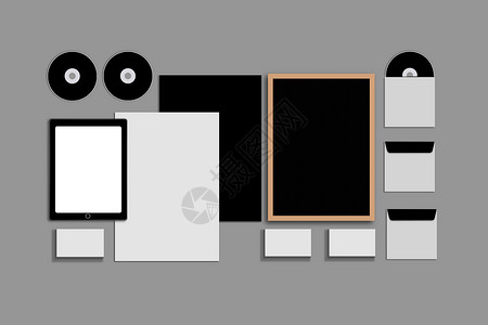 百搭名片空白公司 ID 设置在灰色背景上 包括名片 文件夹 平板电脑 信封 a4 信笺 笔记本 闪光灯 铅笔 cd 盘和智能手机药片品牌背景