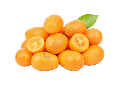 新鲜水果库姆夸特橙子热带绿色叶子团体白色食物高清图片