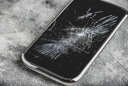 手机裂缝素材屏幕裂开的智能手机下巴工具技术碎屏玻璃维修破坏保险工作展示背景