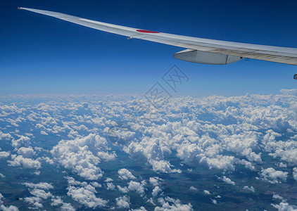 从飞机上看到的景观飞机场窗户交通城市观光航空西洋镜车辆玻璃登山背景图片