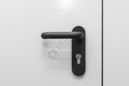 开放或特写房屋出入口的钢门把手 闭上锁房间木头公寓安全闩锁锁孔金属合金建筑学钥匙办公室高清图片素材