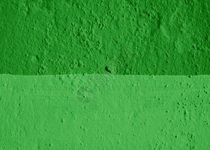 墙上涂有两层绿色的阴影水泥建筑学材料灰色石头工厂双色建筑作品背景图片